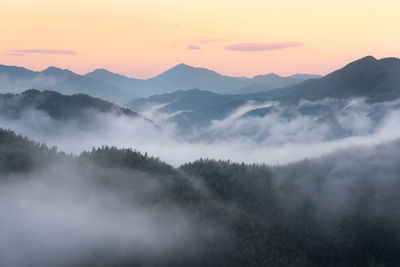 Scenic view of mountains against sky during sunset