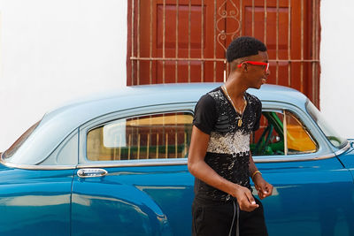 Full length of young man looking at camera