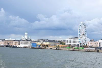 View of buildings against cloudy sky