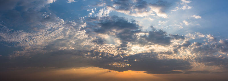 Panoramic view of cloudy sky during sunset