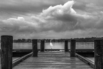 Pier over sea against sky