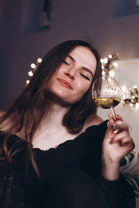 Portrait of a woman drinking glass