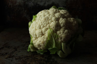 Close-up of cauliflower against black background