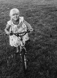 Portrait of boy playing on field