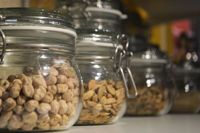 Close-up of candies in jar on table