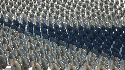 Full frame shot of empty seats at stadium