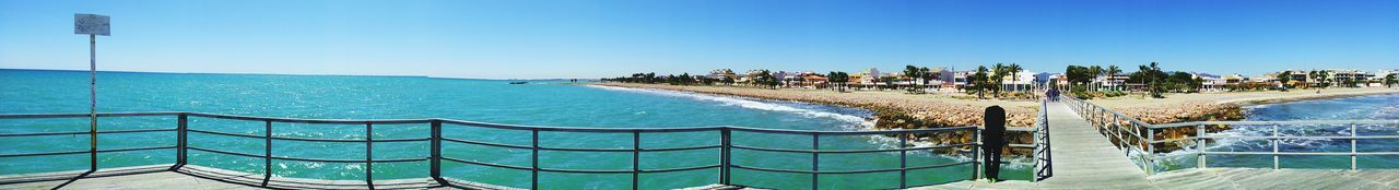 Panoramic view of swimming pool against clear sky