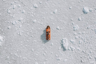 Aerial view of ship inn frozen sea