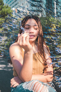 Portrait of beautiful young woman in water