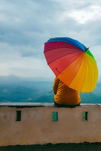 Low angle view of umbrella against sky