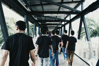 People standing on railroad track