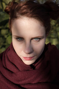 Close-up portrait of a smiling young woman