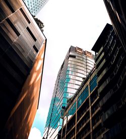 Low angle view of skyscrapers against sky