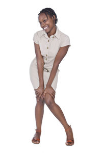 Portrait of a smiling young woman against white background