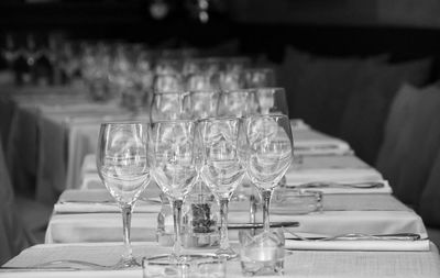 Close-up of wineglasses on table