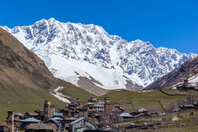 Scenic view of snowcapped mountains against sky