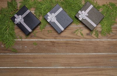 Gift boxes and christmas decorations on table