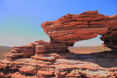 Rock formation against blue sky