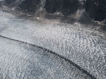 High angle view of water flowing through rocks