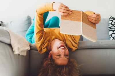 Portrait of woman holding gift box