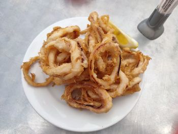 High angle view of meat served in plate on table