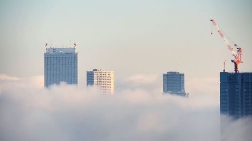 Low angle view of modern buildings against sky