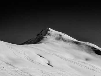 Low angle view of mountain against clear sky