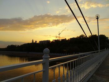 Scenic view of river at sunset