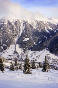 Scenic view of snow covered mountains