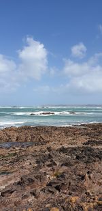 Scenic view of beach against sky