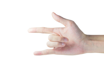 Close-up of human hand against white background