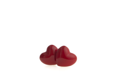 Close-up of red over white background