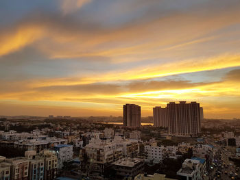 High angle view of city at sunset