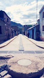 Road in city against sky
