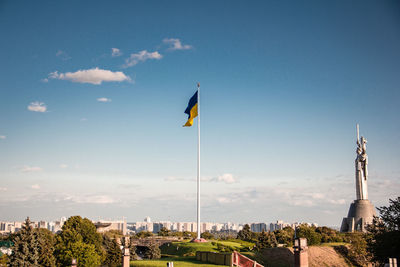 Low angle view of flag against sky