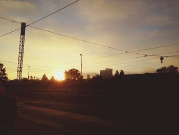 Electricity pylons at sunset