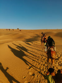 Scenic view of desert against clear sky