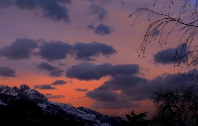 Low angle view of cloudy sky during sunset