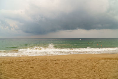 Scenic view of beach against sky