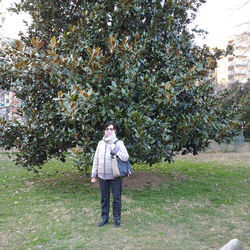 Full length of man standing on field