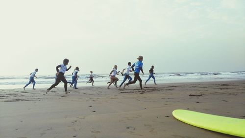 People playing on beach