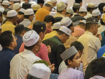 Group of people looking at market