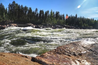 Scenic view of river against sky