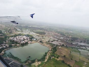 Aerial view of city against sky