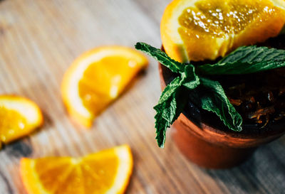 Close-up of orange slices on table