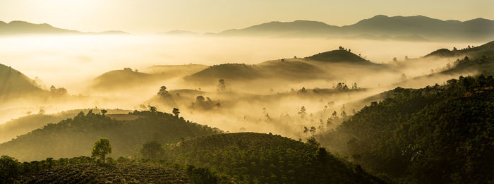 Panoramic view of mountains against sky during sunset