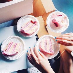 Cropped image of hand holding ice cream