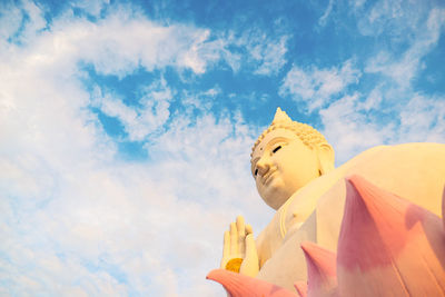 Low angle view of statue against sky