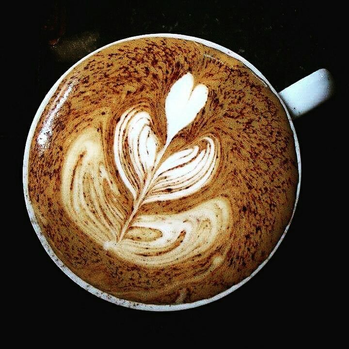 indoors, food and drink, still life, close-up, directly above, studio shot, design, art, spiral, creativity, coffee cup, high angle view, pattern, froth art, refreshment, drink, table, art and craft, circle, freshness