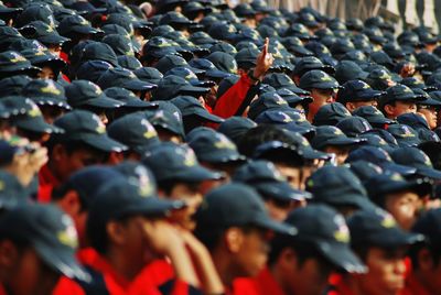 Students wearing cap during celebration in school